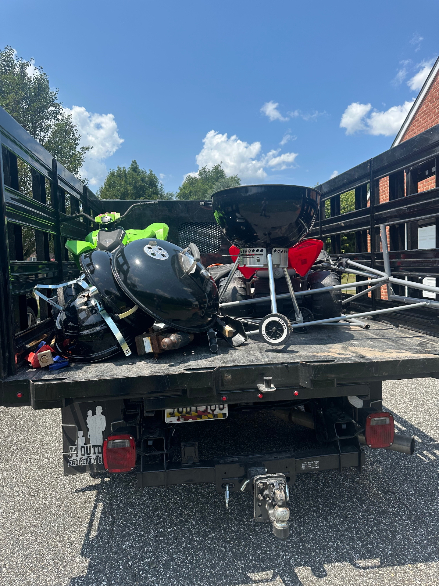 J4 Outdoors picking up grills and outdoor items